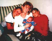 brittany with her big girl cousins amanda and kristina and her aunt rose march 98.jpg (166590 bytes)