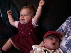 Jenna is excited about brother..jpg (90635 bytes)