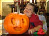 Charlie smiling with pumpkin small.jpg (72419 bytes)