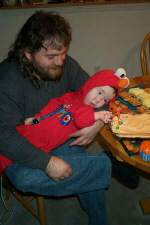 colin_playing_with_icing.jpg (71845 bytes)